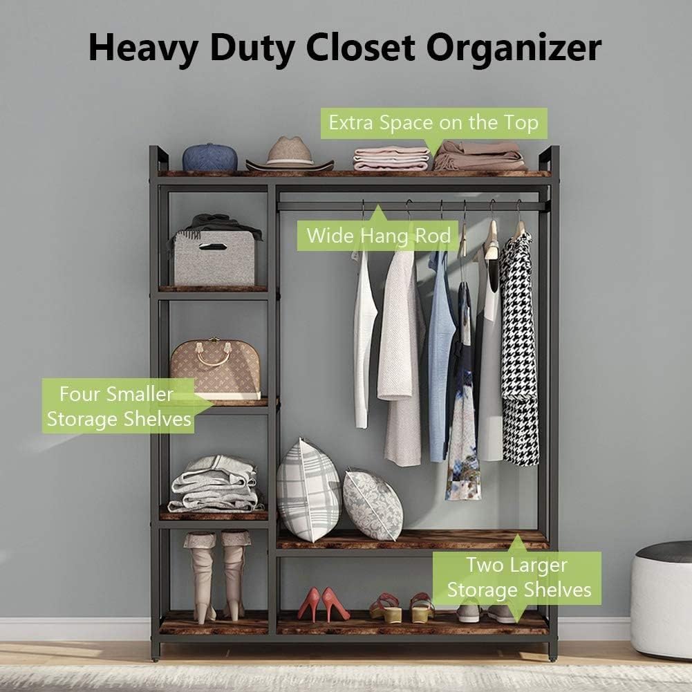 A freestanding wooden clothes rack from Dressing Ventura, heavy-duty with...