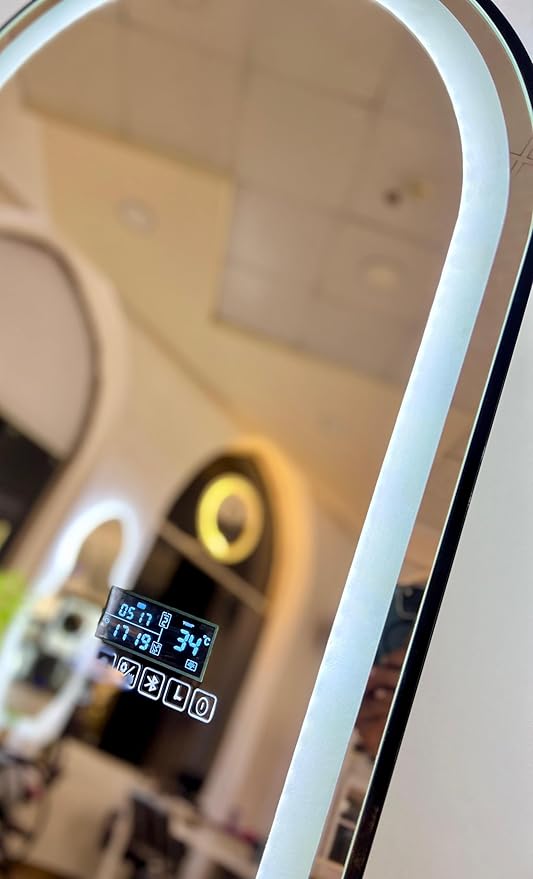 Smart LED mirror with Bluetooth technology, anti-fog, touch control, built-in heater, speaker, digital clock, temperature and date display, and 3 adjustable lighting modes from Leon Home, 1.7m x 60cm