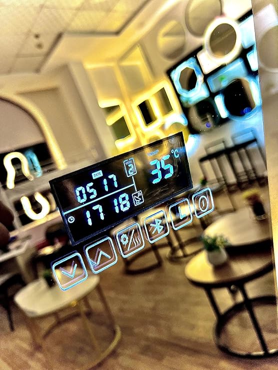 Smart LED mirror with Bluetooth technology, anti-fog, touch control, built-in heater, speaker, digital clock, temperature and date display, and 3 adjustable lighting modes from Leon Home, 1.7m x 60cm