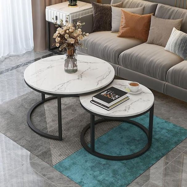 A center table made of two pieces of metal and marble wood.