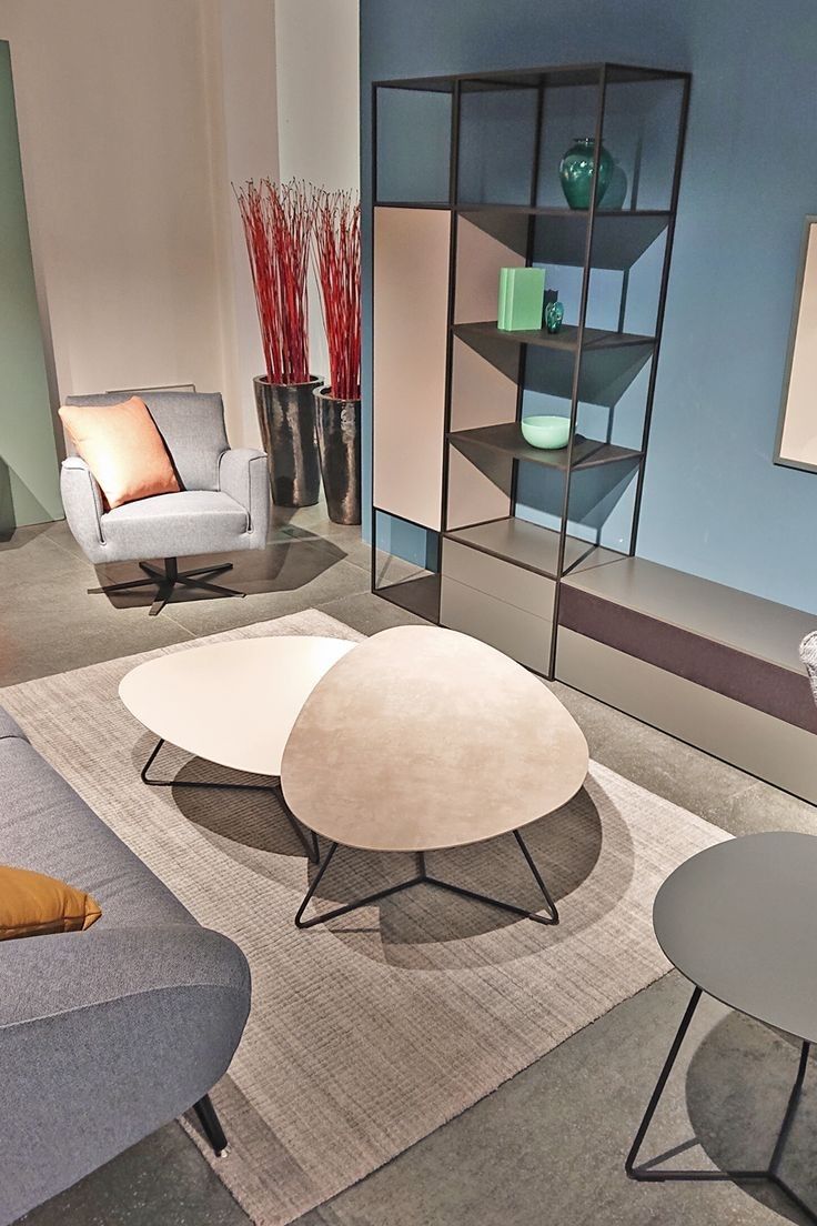 Two-piece oval-shaped center table