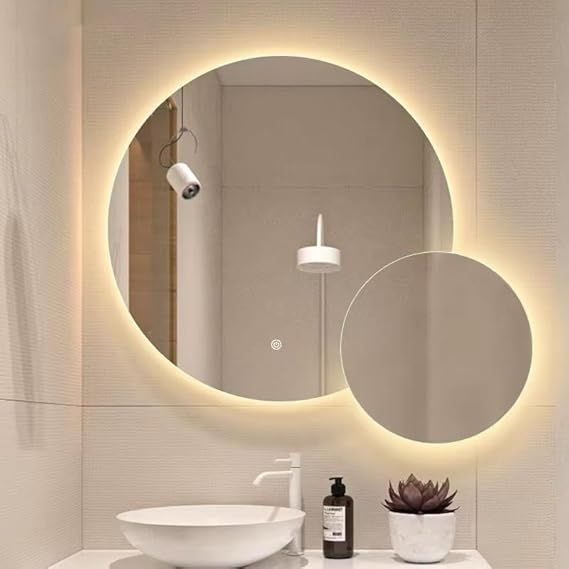 Luxury round bathroom mirror with LED lighting. This backlit mirror features three color temperatures, touch control, and anti-fog functionality. A luxurious round mirror for modern bathrooms, 70 cm in size.