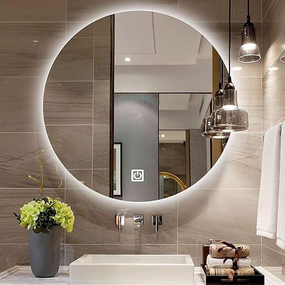 Luxury round bathroom mirror with LED lighting. This backlit mirror features three color temperatures, touch control, and anti-fog functionality. A luxurious round mirror for modern bathrooms, 70 cm in size.