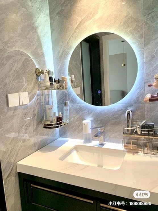 Luxury round bathroom mirror with LED lighting. This backlit mirror features three color temperatures, touch control, and anti-fog functionality. A luxurious round mirror for modern bathrooms, 70 cm in size.