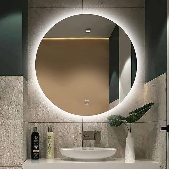 Luxury round bathroom mirror with LED lighting. This backlit mirror features three color temperatures, touch control, and anti-fog functionality. A luxurious round mirror for modern bathrooms, 70 cm in size.
